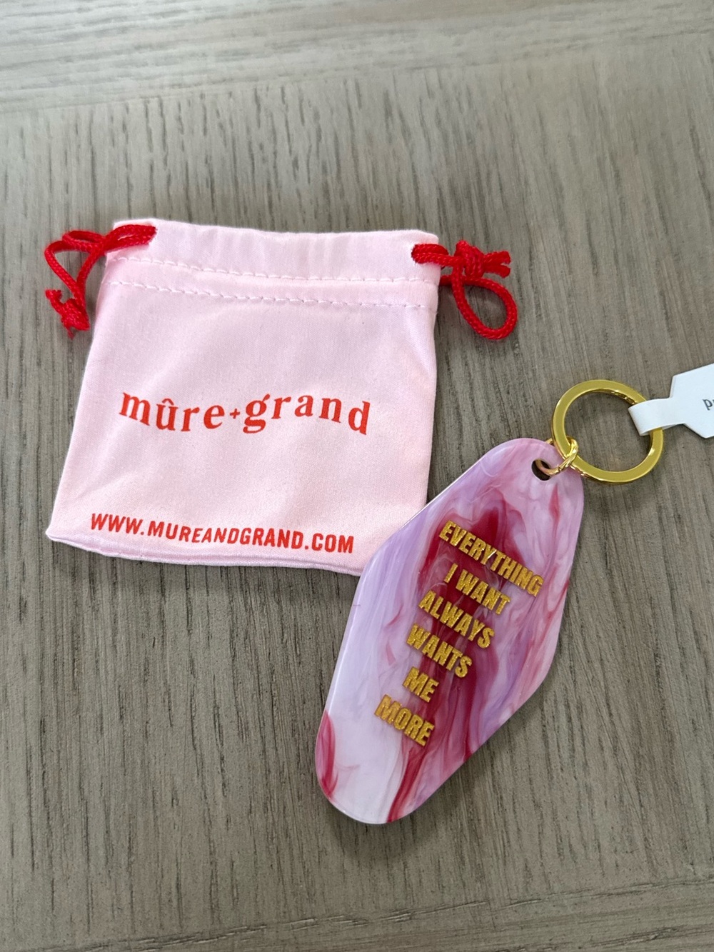 Mure Grand “Everything I Want Always Wants Me More” Pink And Gold Keychain NWT